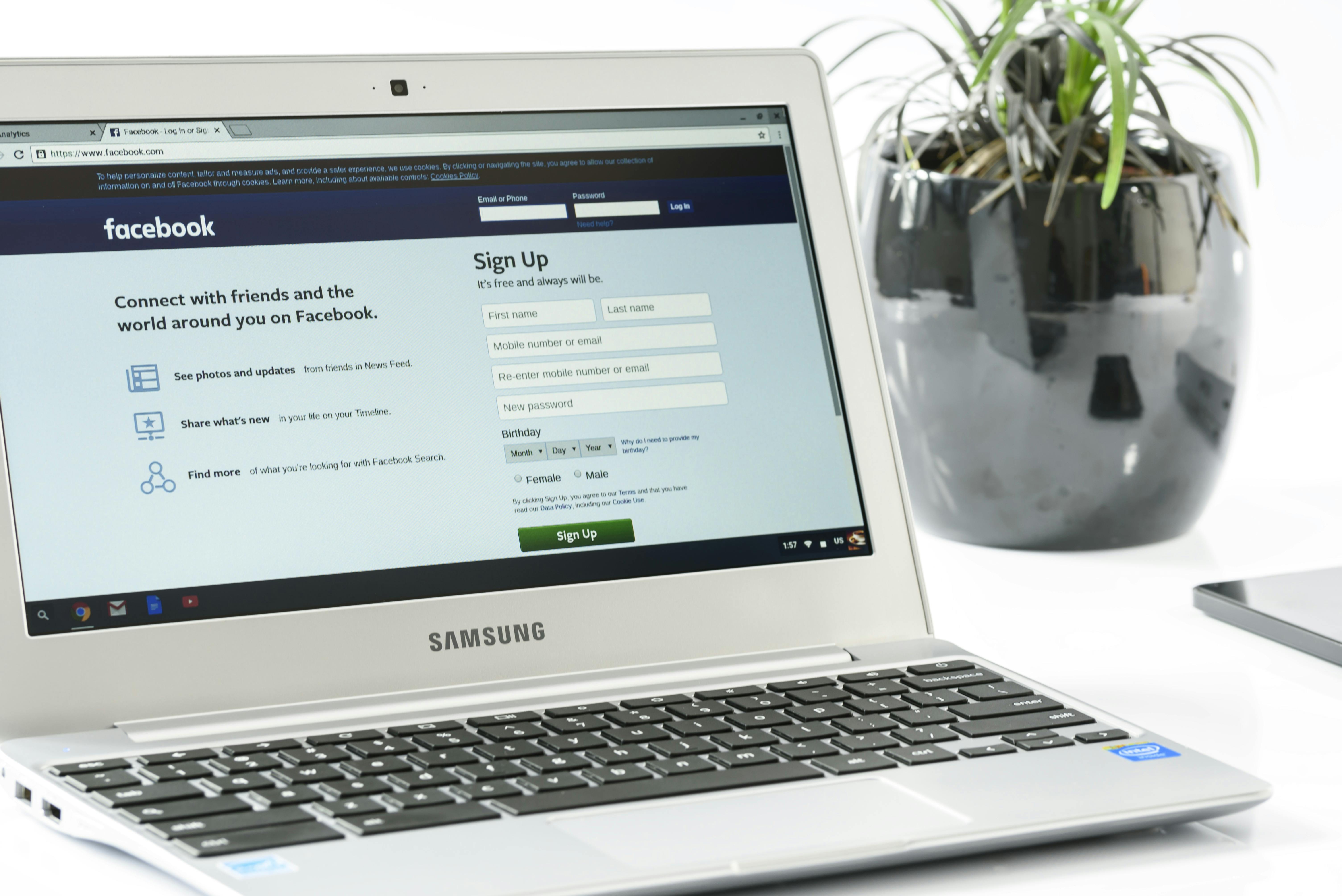 facebook website open on laptop